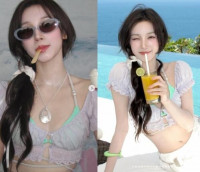 이러니 안 반해?… 우기, 휴양지 사로잡은 '요염+우아' 비주얼